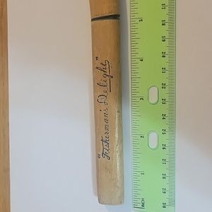 Fisher man's delight, serrated knife in wooden sheathing.